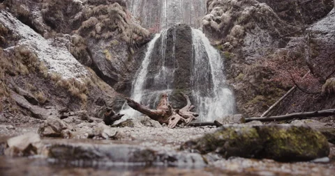 Shot of waterfall in forest with rocks and trees Stock Footage 150345507
