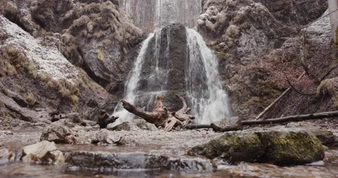 Shot of waterfall in forest with rocks and trees Stock Footage 150348854