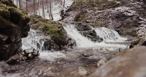 Shot of waterfall in forest with rocks and trees Stock Footage 150355531