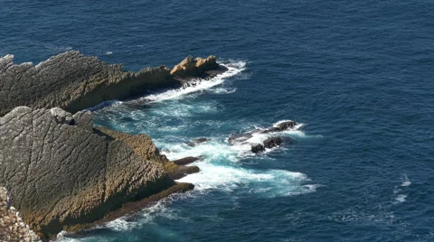 Shot of Waves Breaking onto Rocks Stock Footage 40955361