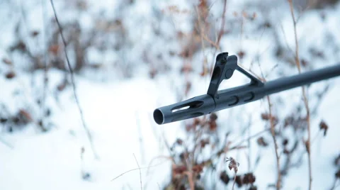 Shot weapons against the backdrop of snow Stock Footage 44787190