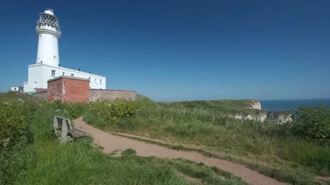 Shot of white lighthouse in the UK Stock Footage 199961851