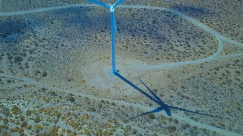 Shot of Windmill in Mojave Desert, Camera tilt up slightly. Stock Footage 86587164
