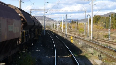 Shot from a window in the back of an old train in daylight, 4K Stock Footage 97475797