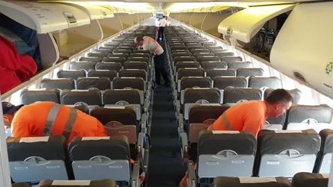 Shot of workers cleaning aircraft interior Stock Footage 280788285