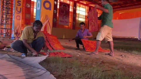 A Shot of Workers Decorating Durga Puja Pandal with Idols in India Stock Footage 332106834