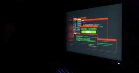 Shot of a young hacker cracking a computer code in the dark Stock Footage 151447903