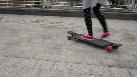 Shot of a young woman out skateboarding in the city Stock Footage