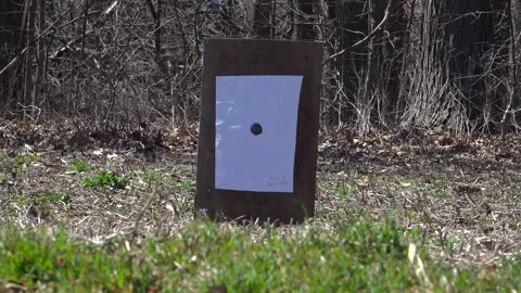 Shotgun Blast Hitting Paper Target During Turkey Hunting Pattern Practice Stock Footage 345167313