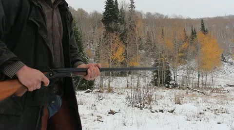 Shotgun Hip shot smoking barrel Stock Footage