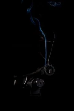 Shotgun muzzle with smoke Foto stock