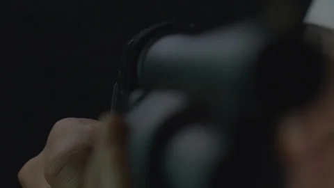 A shotgun shell is ejected from a shotgun. Close up shot, shallow depth of Stock Footage 104935517