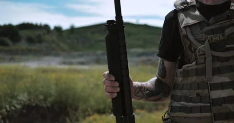 A shotgun shell is ejected from a shotgun Video stock 134386117