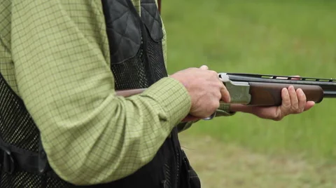 Shotgun Shells ejecting male Stock Footage 49396837