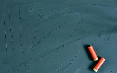 Shotgun shells isolated on background. Top view. Copy text place. Stock Photos