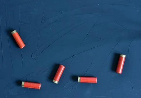 Shotgun shells isolated on background. Top view. Copy text place. Stock Photos