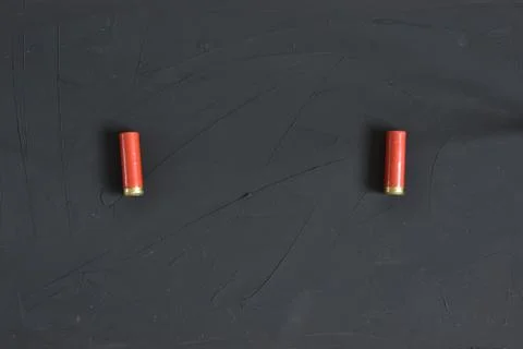 Shotgun shells isolated on background. Top view. Copy text place. Stock Photos