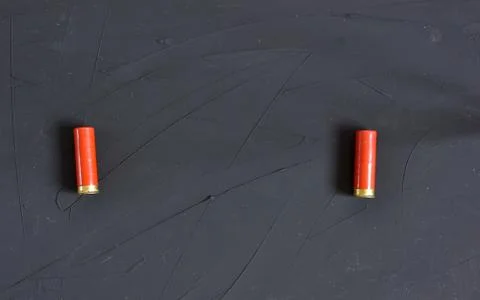 Shotgun shells isolated on background. Top view. Copy text place. Stock Photos