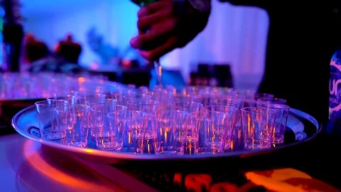 Shots being poured at a bar Видео 129834269