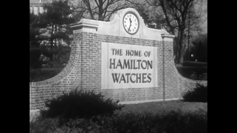 Shots of the Hamilton Watch facility, and group of employees gather at a Vídeos de archivo 88554154