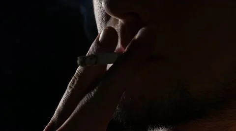 Man Lights A Cigarette In Dark - Stock Video