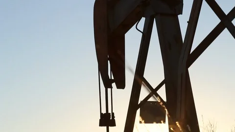 Shots of the oil fields at dusk in Texas Stock Footage 128649111