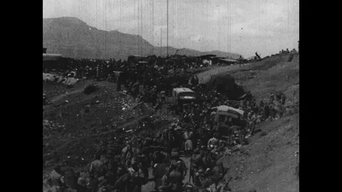 Shots of soldiers marching in troops with baggages, Ethiopia Stock Footage 132321939