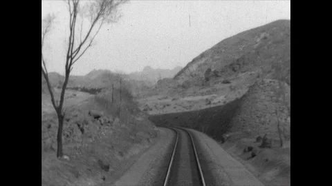 Shots from a train moving through rural countryside areas of China, 1939 China Stock-Footage 131528558