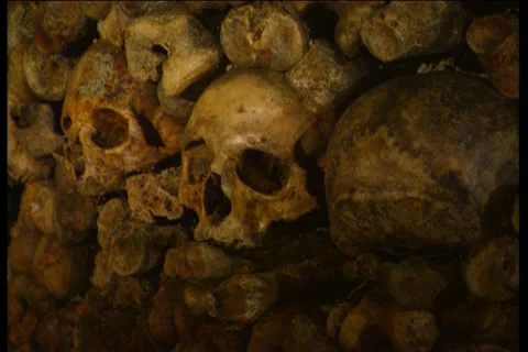 Shots of underground catacombs full of bones beneath Paris, France 1992 Stock Footage 170066071