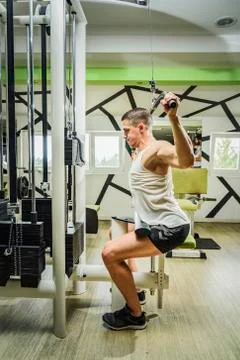 Shoulder pull down exercise Stock Photos