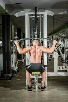 Shoulder pull down exercise Stock Photos