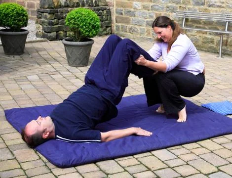 Shoulder stand position Stock Photos