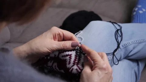Shoulder view knitting with black and white yarn. Stock Footage 263611142