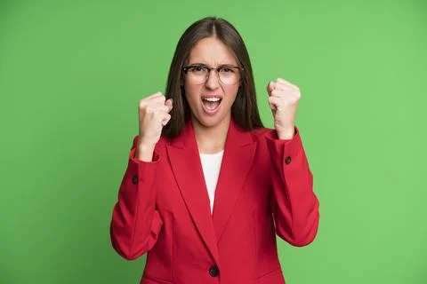 Shouting aggressively with an angry expression Foto stock