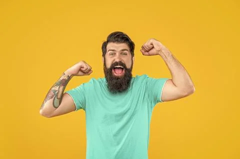 Shouting bearded man in studio. bearded man on background. Stock Photos