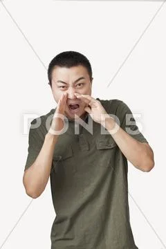 Shouting Chinese man Stock Photos
