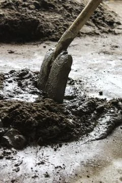 Shovel in the cement, working process during holidays at home Foto stock