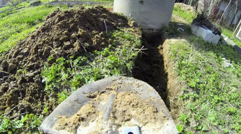 Shovel digging in the ground Video stock 24815625