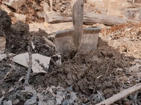 Shovel digging land Stock Photos
