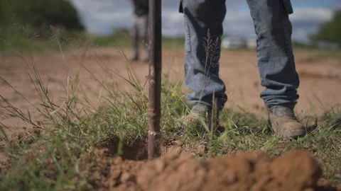 Shovel digs deep into earth Stock Footage 337587424