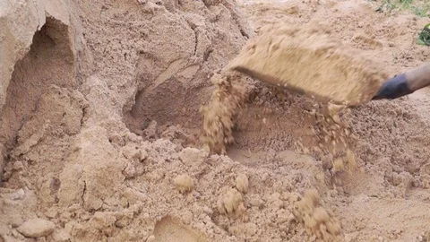 Shovel get sand thrown to the side Stock Footage 71487528