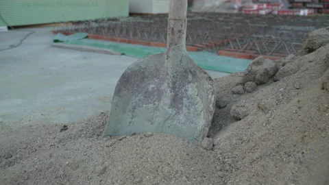 Shovel in sand at the construction site slow motion Stock Footage 252137312