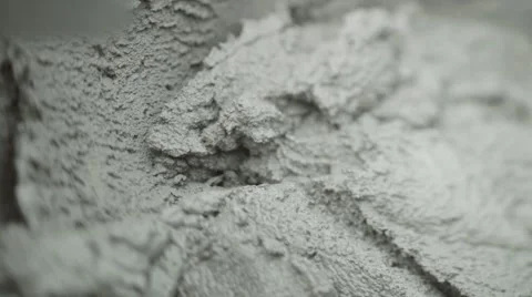 The shovel is scooping the cement mixture Stock Footage 58539672