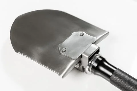 Shovel with a shock plate with function of hammer on a white background Stock Photos