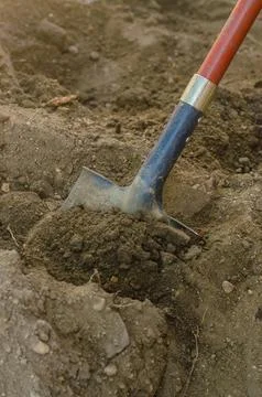 Shovel in the soil Stock Photos