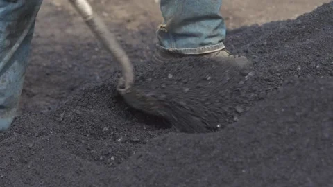 Shoveling Asphalt by Construction Worker Stock Footage 172255270