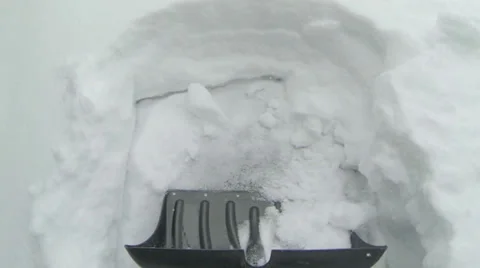 Shoveling Deep Snow - Slow Motion Stock Footage 35223398