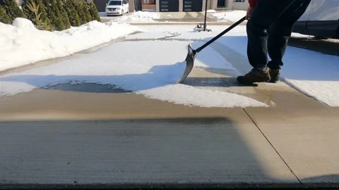 Shoveling driveway Stock Footage 148181802
