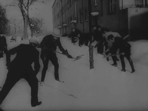 Shoveling sidewalks Stock Footage 229028827