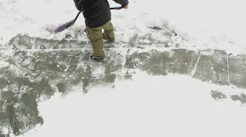 Shoveling snow 1 Stock Footage 21235265